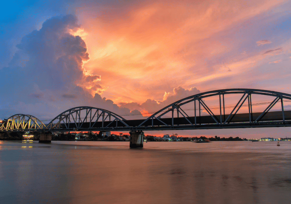 Bridge over water representing transition from survival mode to healthy limits in setting boundaries